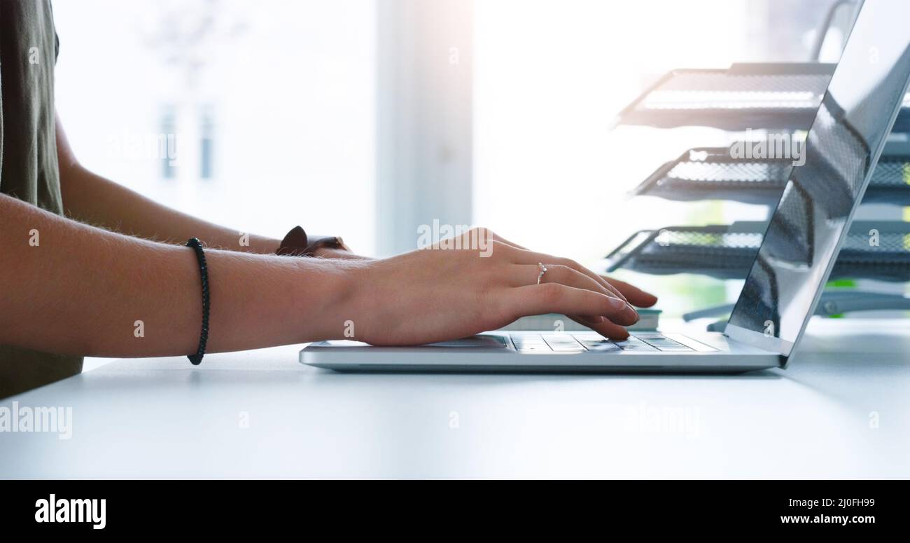 Woman sitting at desk and back straight hi-res stock photography