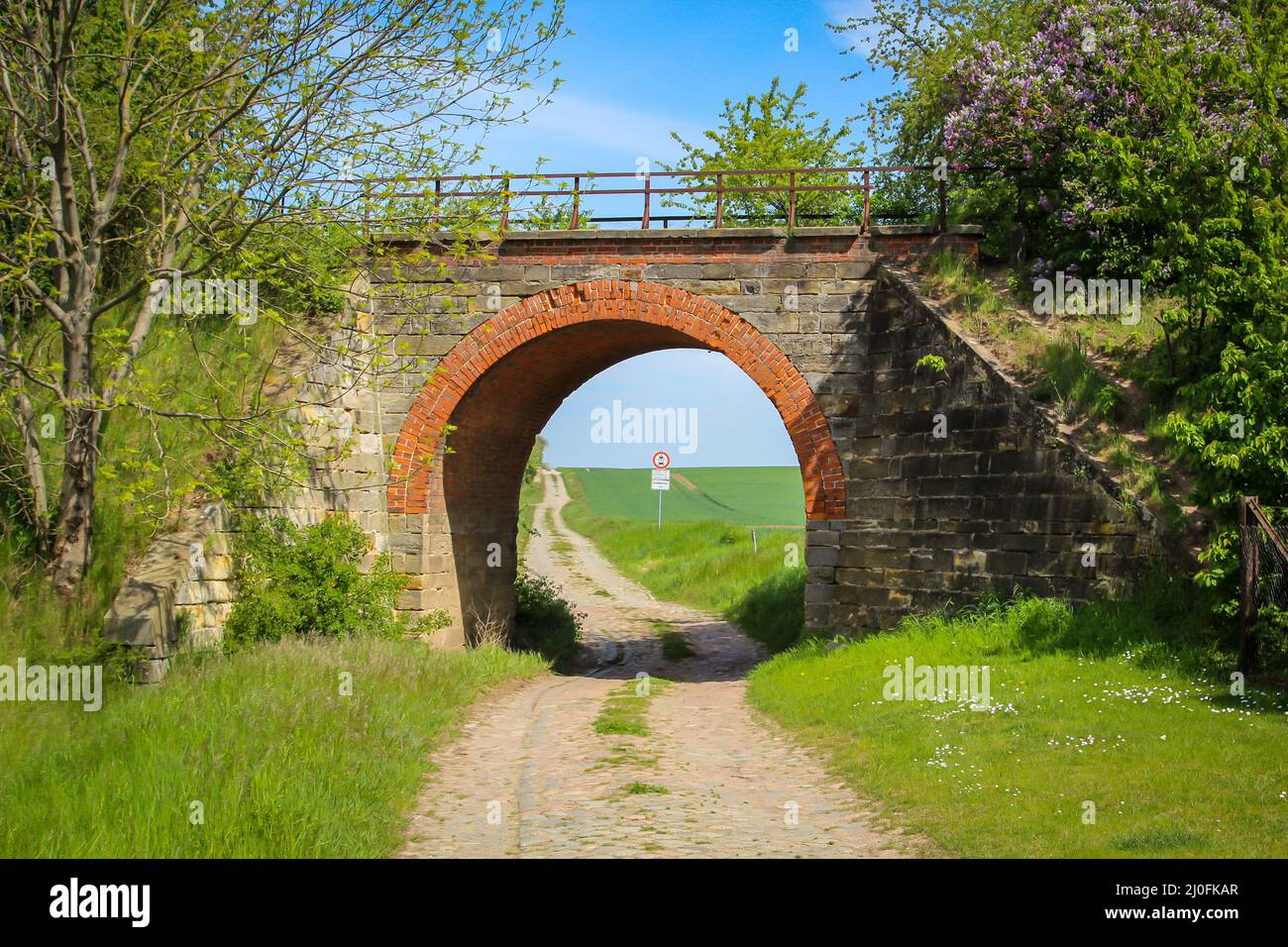 An old one-way railway bridge still preserved. Stock Photo