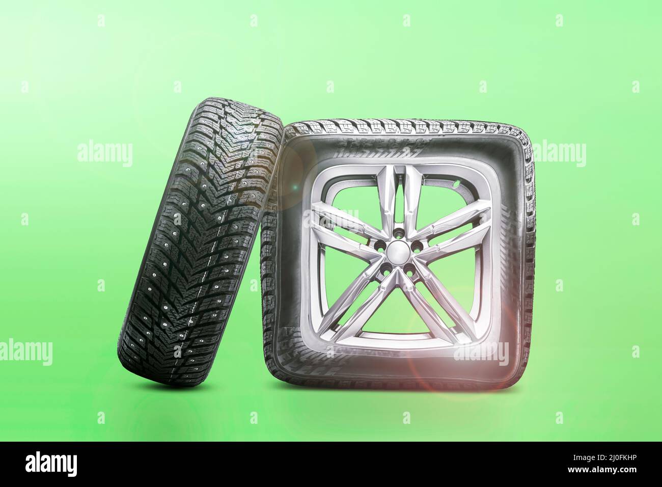 The new funny fake tire is square, damaged or repaired on a summer