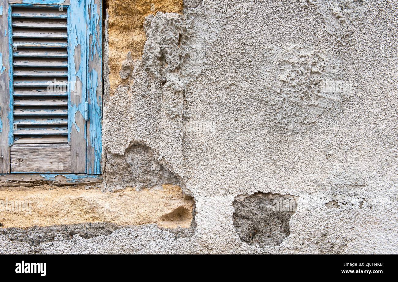Blue window on a white wall Stock Photo