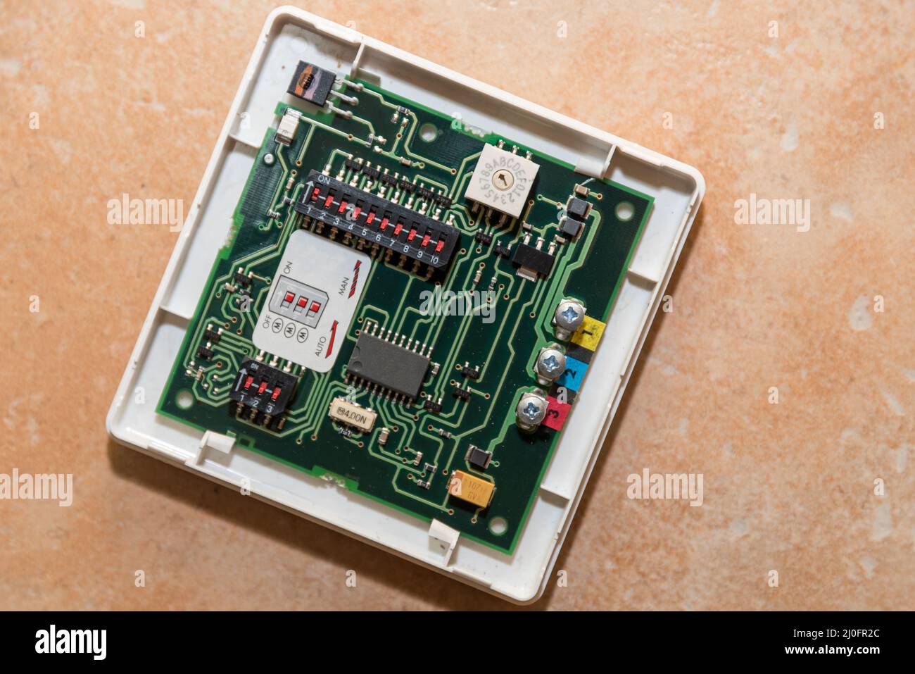 Relays and other components on a circuit board circuit Stock Photo