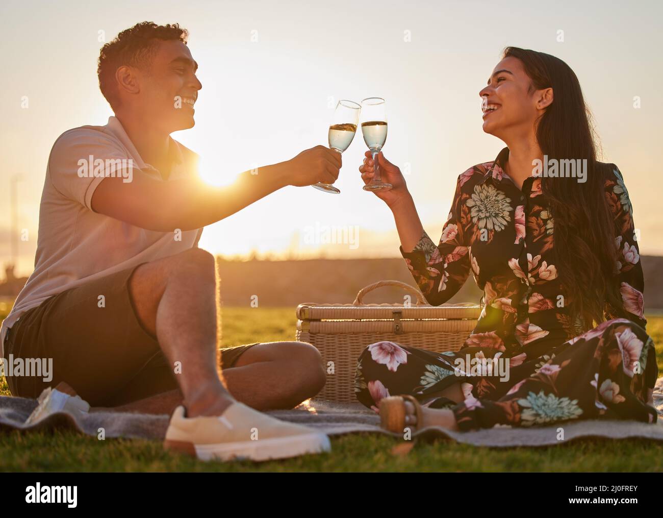 Couple and picnic and wine and sunset hi-res stock photography and ...