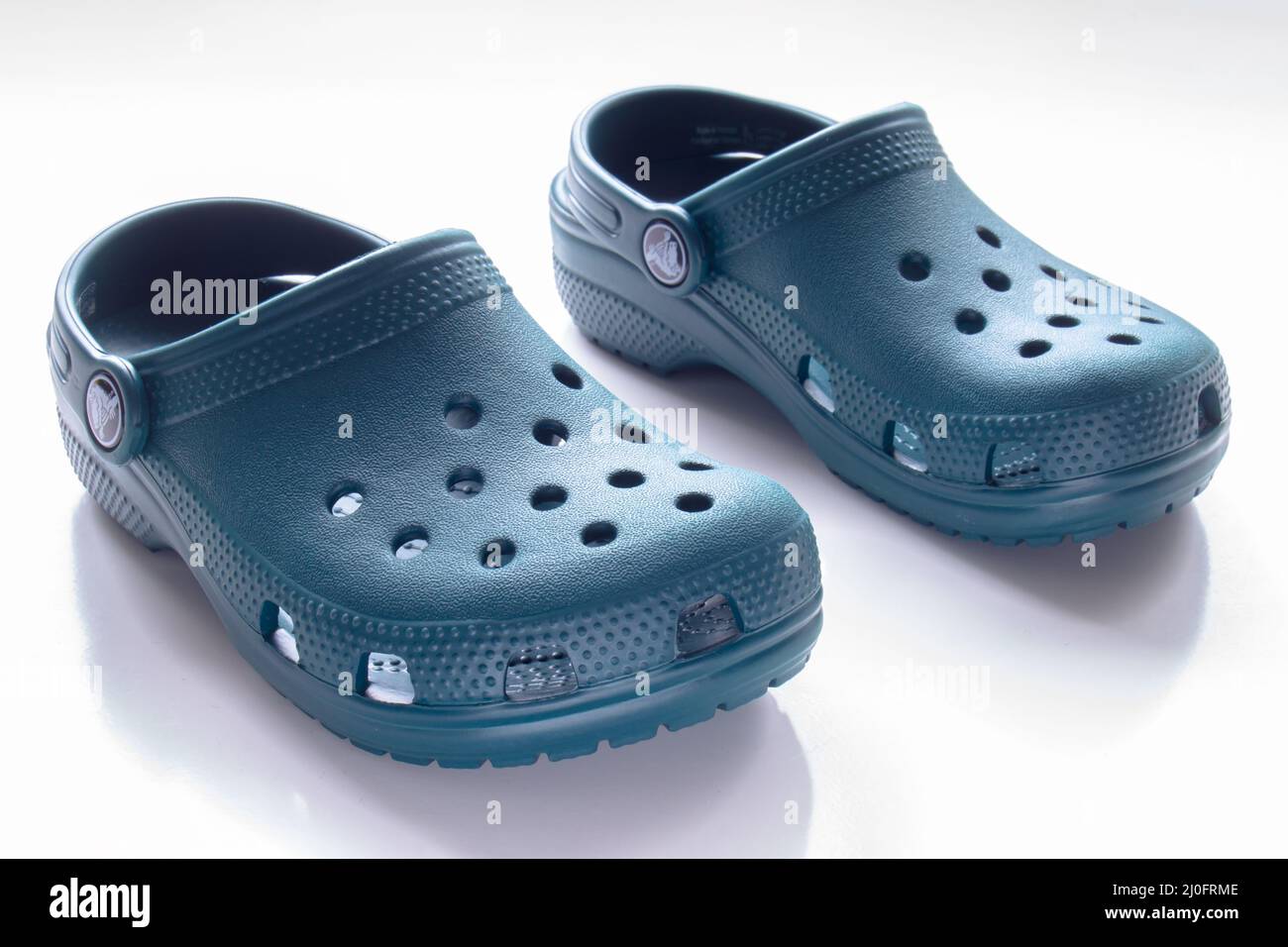 Calgary, Alberta, Canada. Nov. 19, 2020. Front View of Blue Crocs footwear,  foam clog shoes on a white background Stock Photo - Alamy