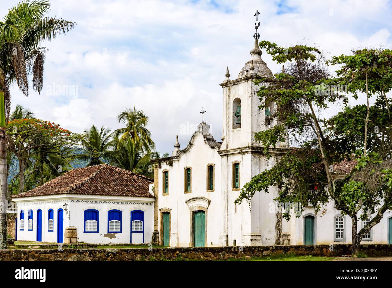 Famous churche between th vegetation in the ancient and historic city of Paraty Stock Photo