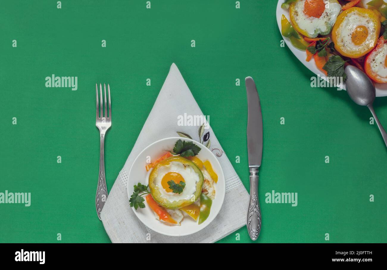Baked bell pepper with egg inside the pepper Stock Photo Alamy