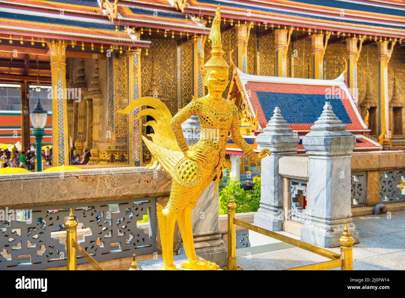 Statue of mythical creature Kinnari at Temple of Emerald Buddha in Bangkok Stock Photo