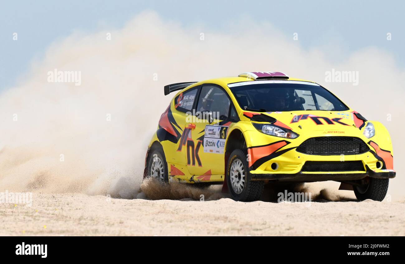 Ahmadi Governorate, Kuwait. 18th Mar, 2022. Nasser K Al-Atya and Giovanni Bernacchini steer their rally car during the Kuwait International Rally, the 3rd round of FIA Middle East Rally Championship, in Ahmadi Governorate, Kuwait, on March 18, 2022. Credit: Str/Xinhua/Alamy Live News Stock Photo
