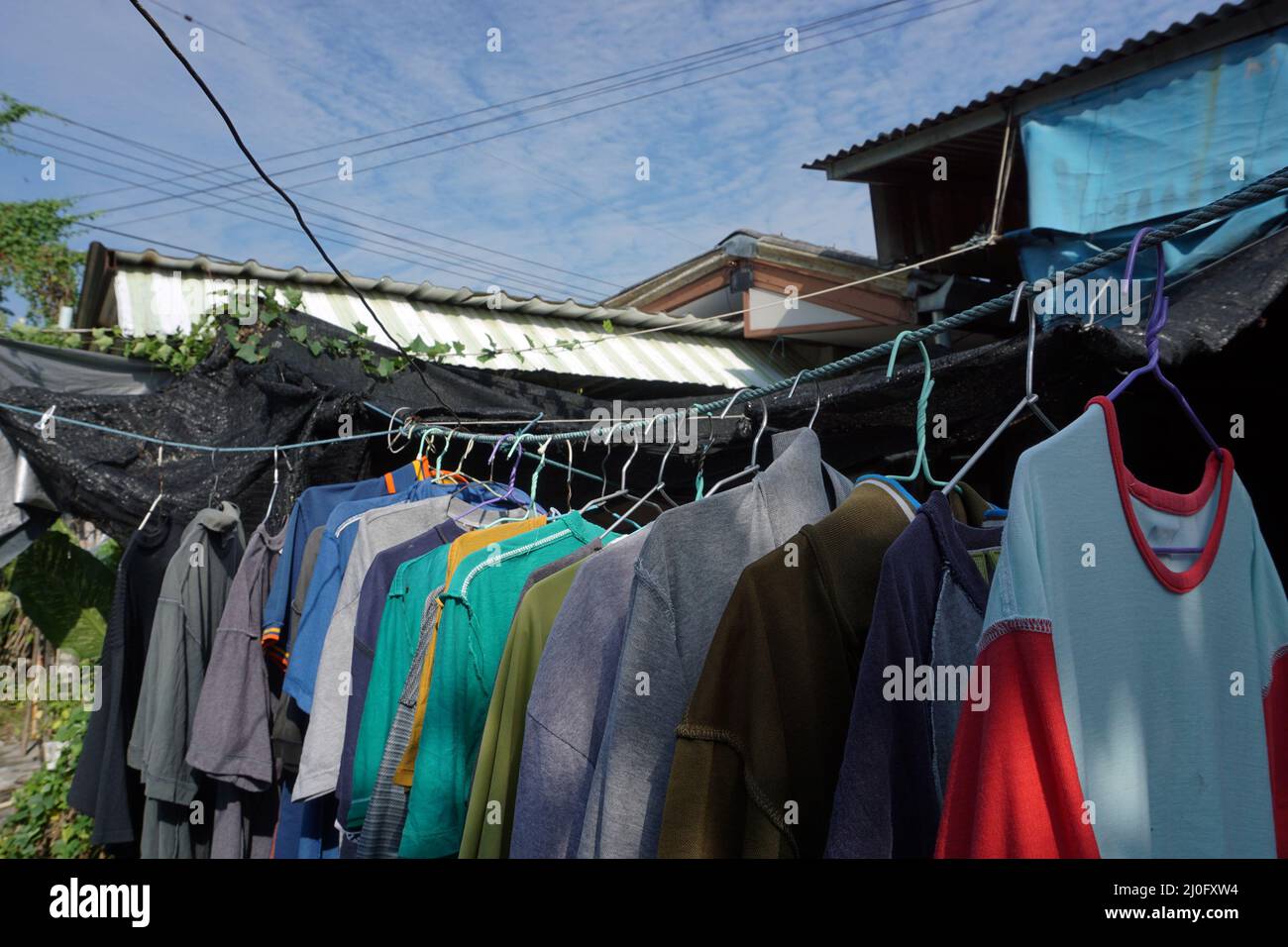 Hang clothes and pants to dry after washing Stock Photo Alamy