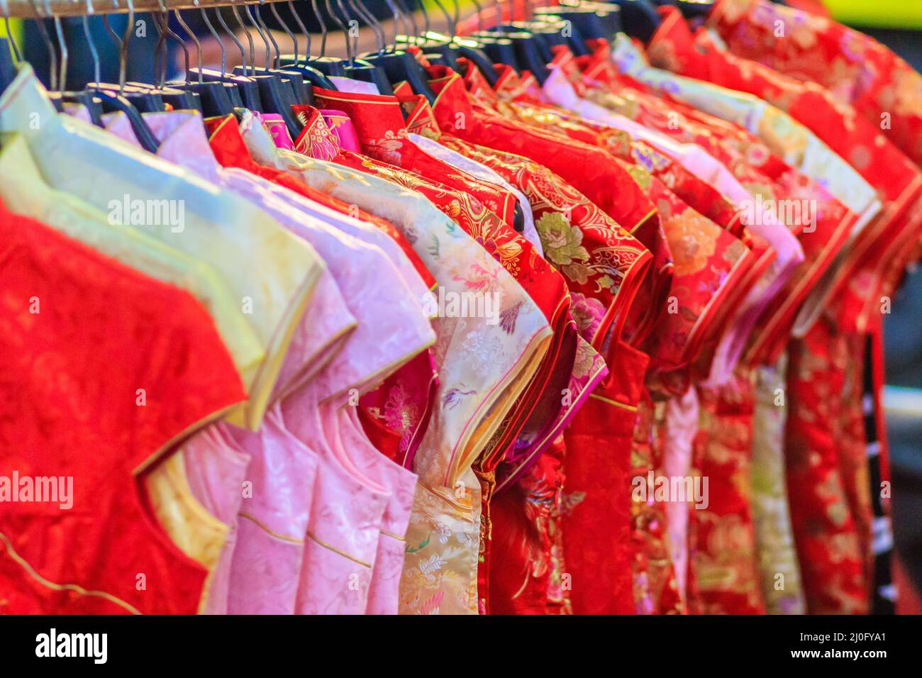 Beautiful Qipao (cheongsam dress or Chinese dress) for women hanging on