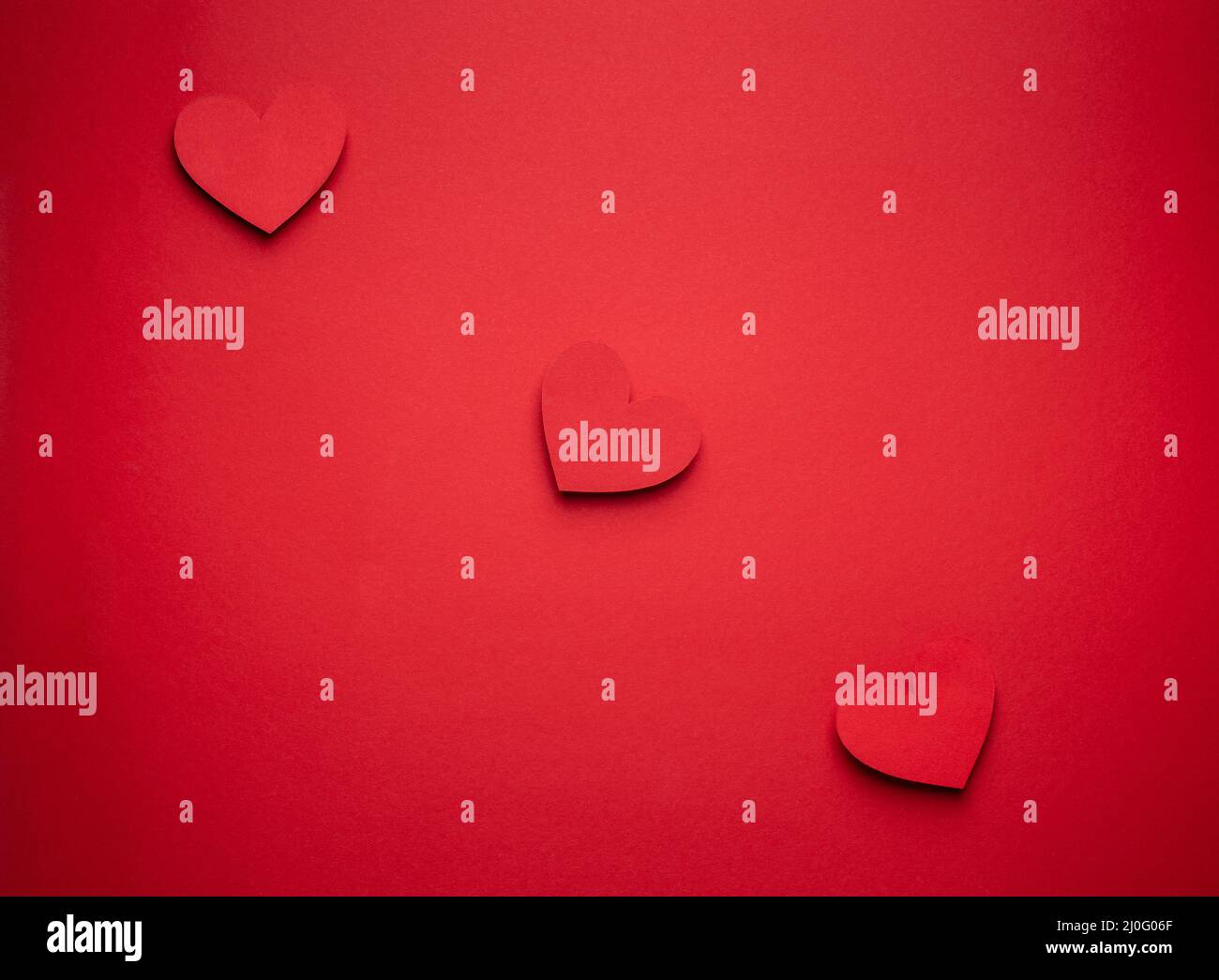 Valentine's day background with paper hearts Stock Photo - Alamy