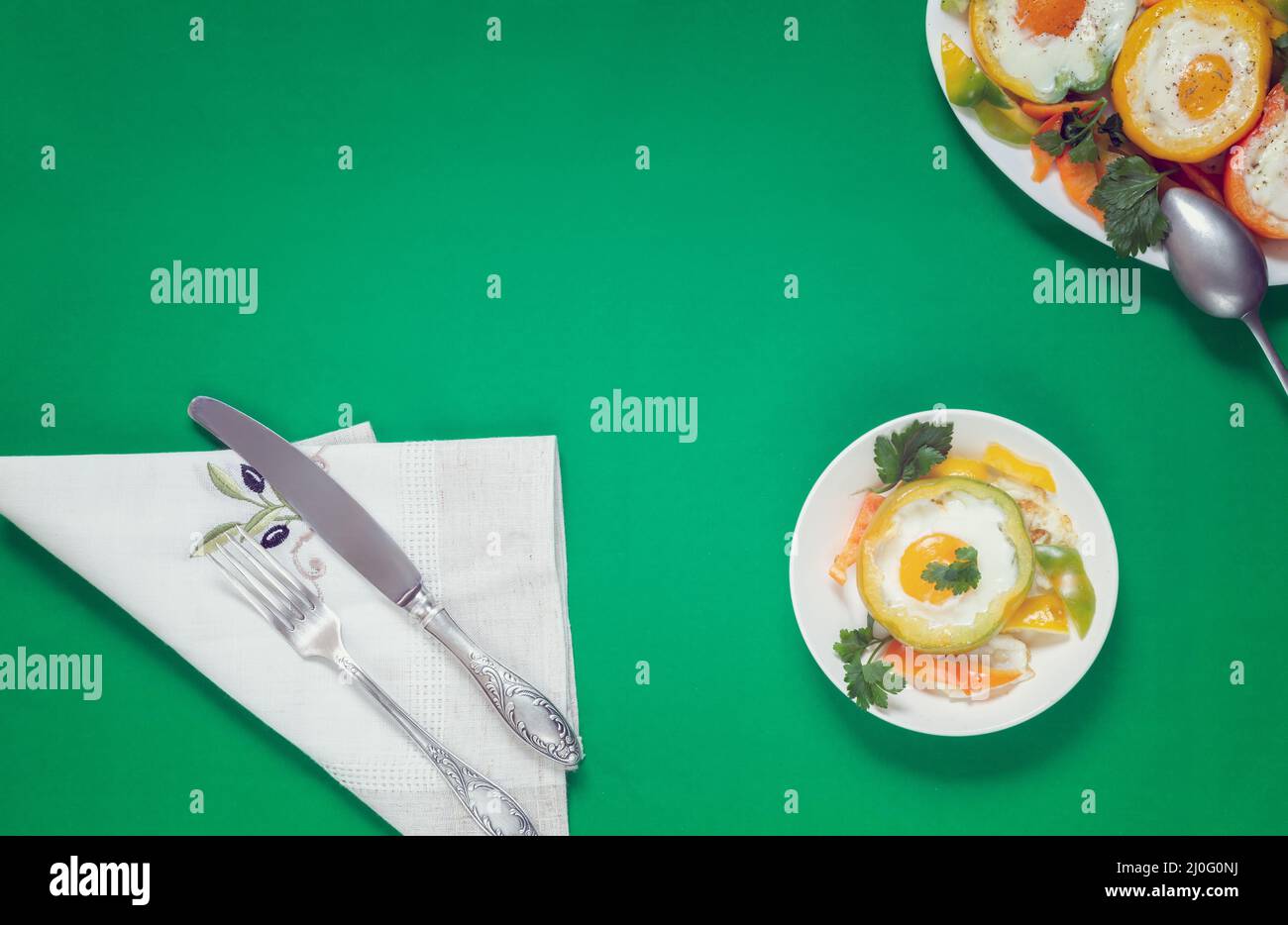 Baked bell pepper with egg inside the pepper Stock Photo Alamy