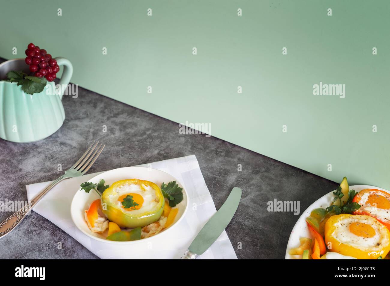 Baked bell pepper with egg inside the pepper Stock Photo Alamy