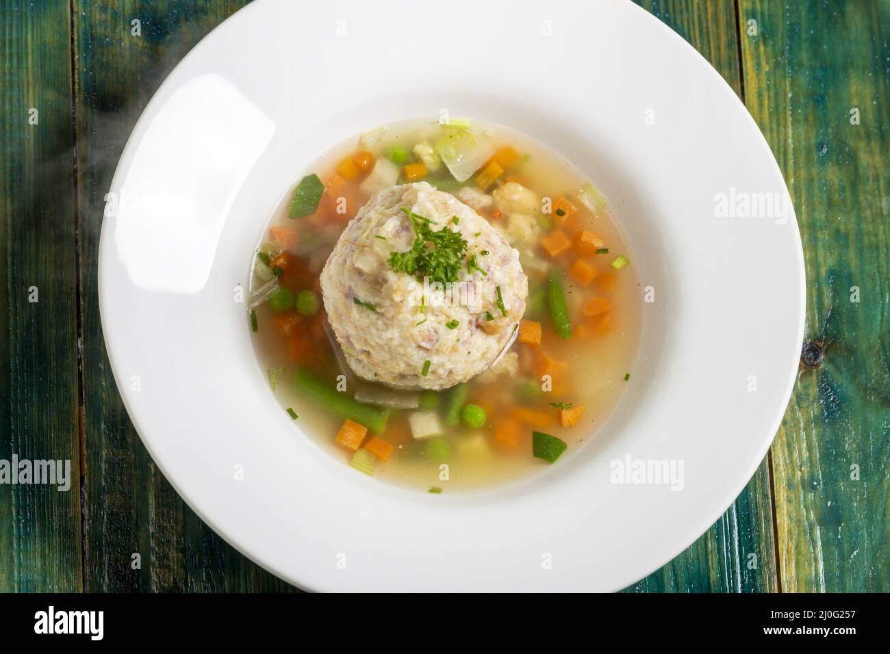 Vegetable soup with dumplings Stock Photo Alamy