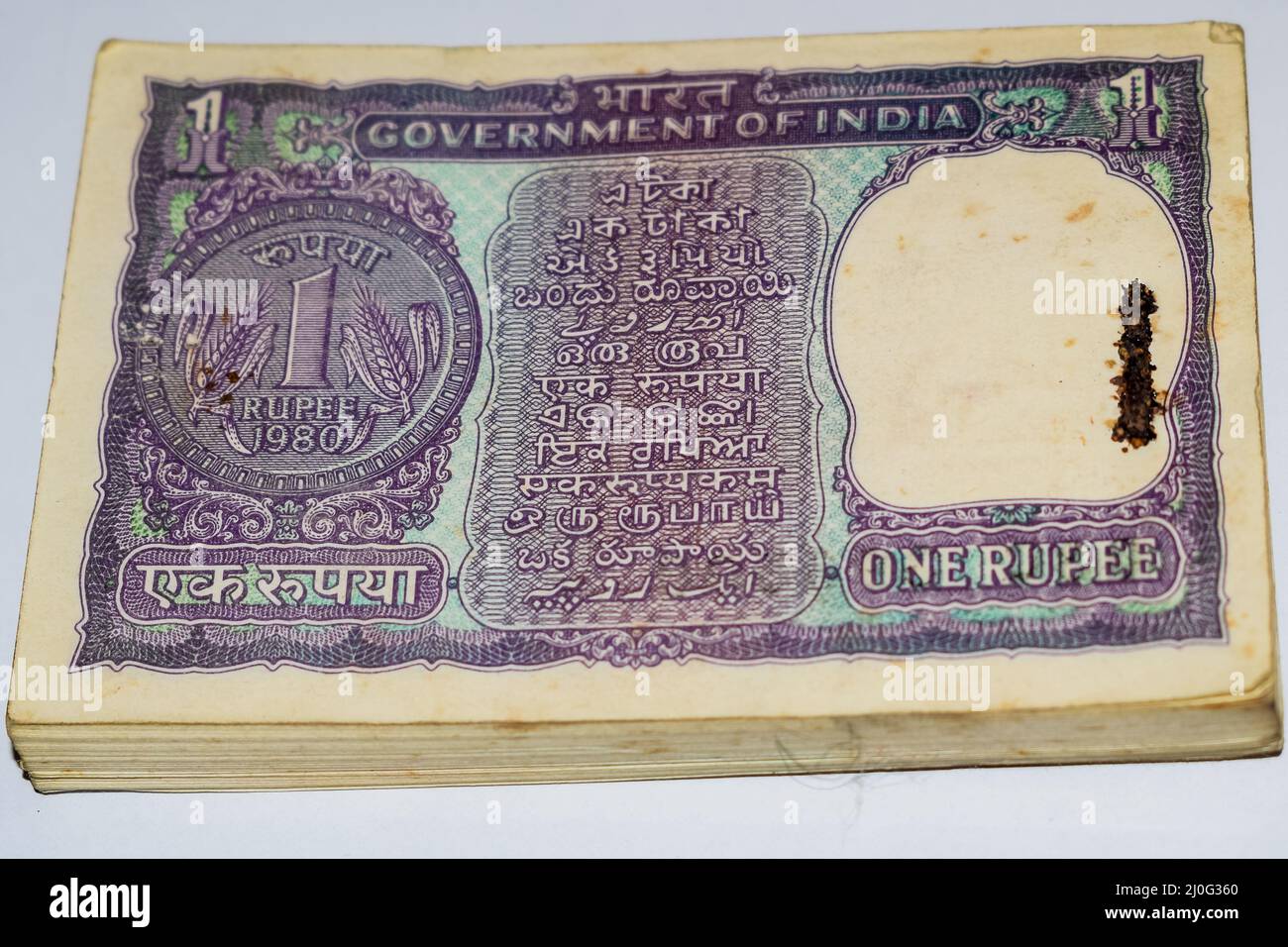 Old One Rupee notes combined on the table, India money on the rotating table. Old Indian Currency note on a rotating table, Indian Currency on the tab Stock Photo