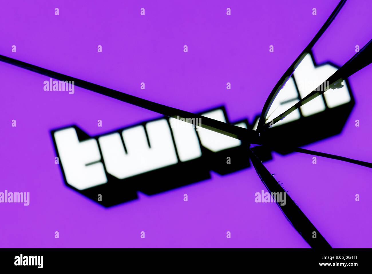 Logo Of The Twitch Live Streaming Service In The Reflection Of A Broken Mirror The Concept Of Problems In The Work Of Stock Photo Alamy