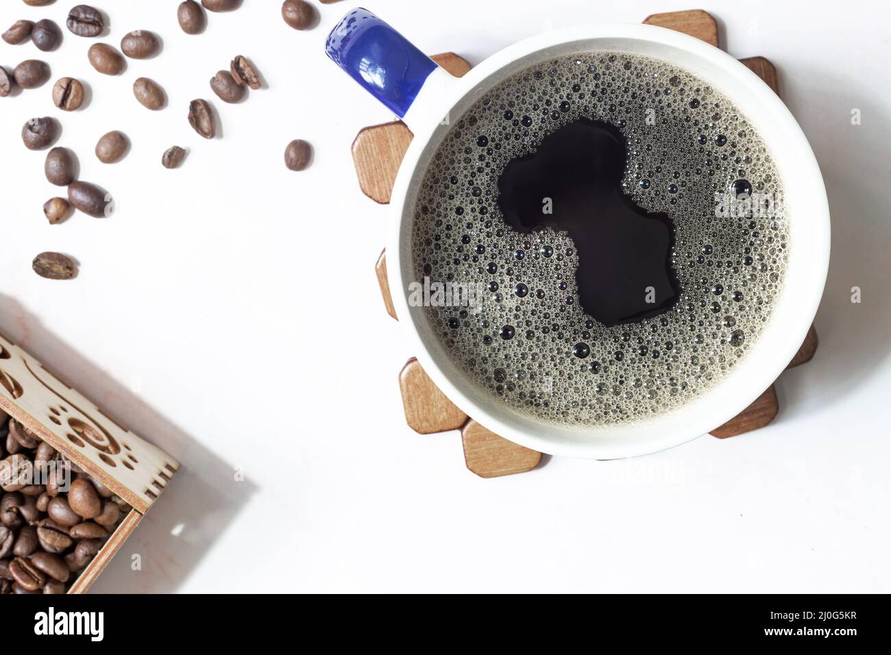 Black coffee in a Cup on the table Stock Photo