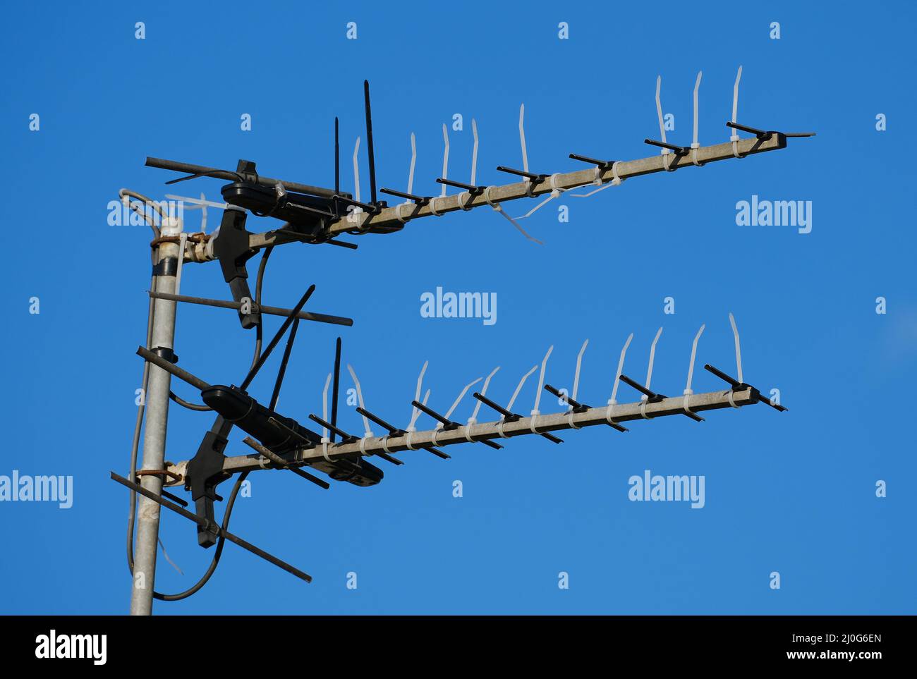 Television aerials with plastic cable ties fitted to deter birds