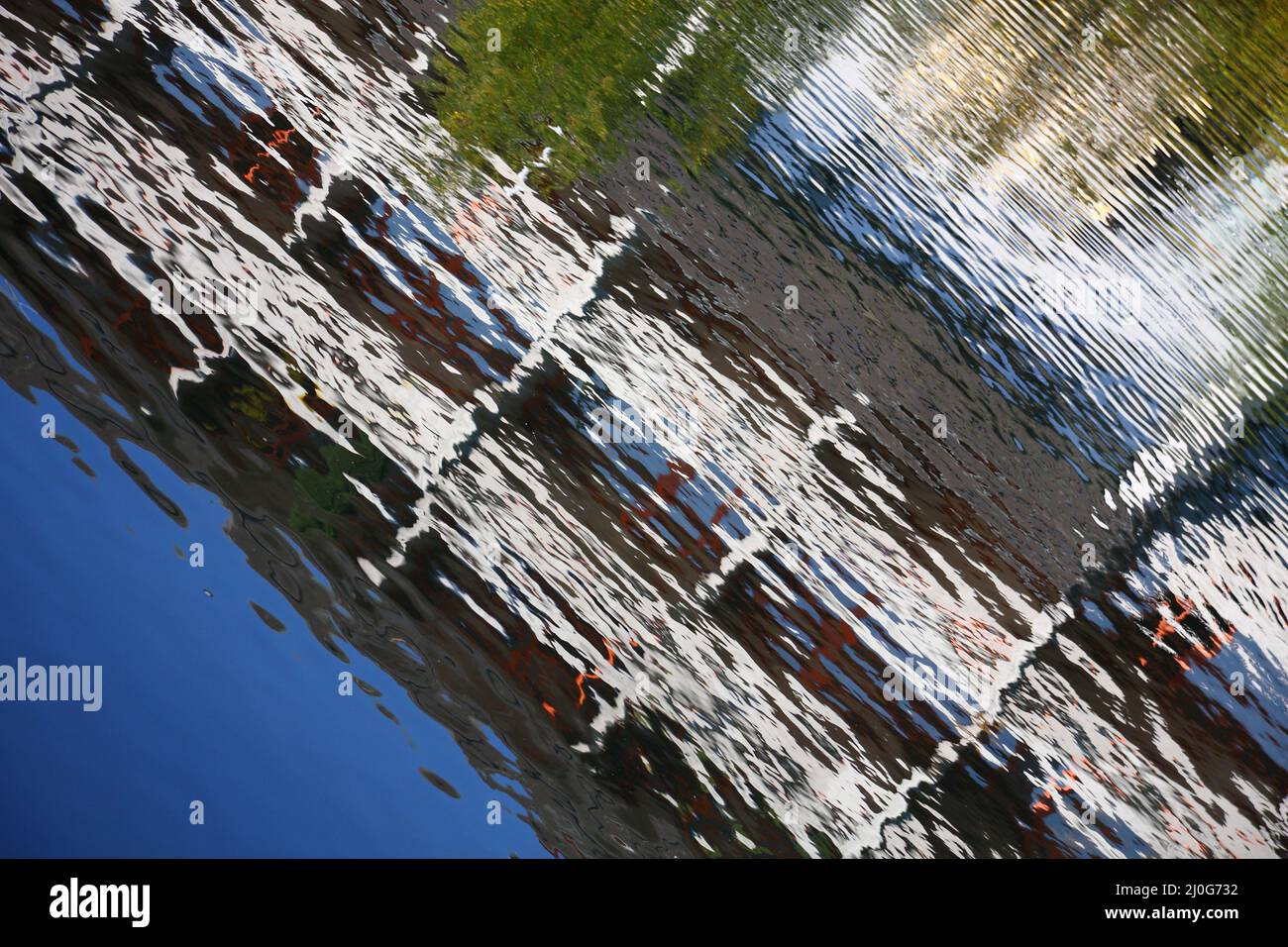 Using Rivers For Reflection Examples Building reflection in the river Stock Photo - Alamy
