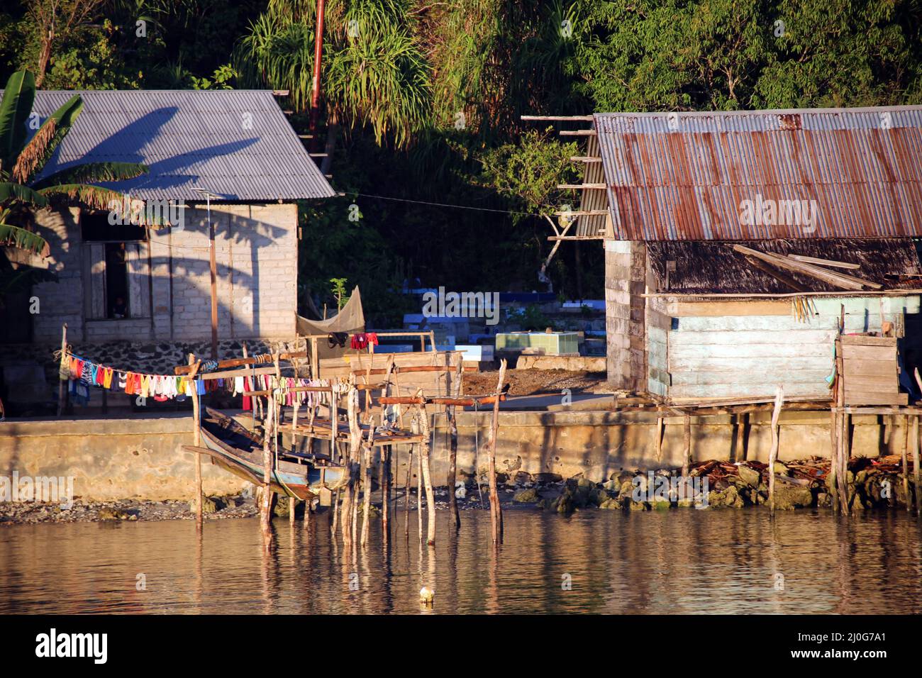 Small, nameless fishing village on the island of Muari Stock Photo