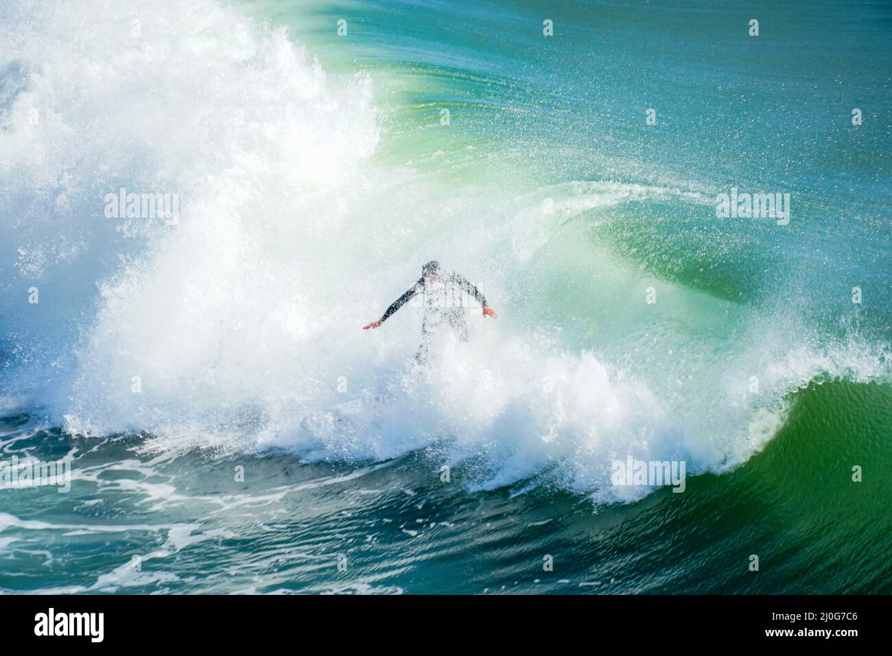 Big wave surfers hi-res stock photography and images - Alamy