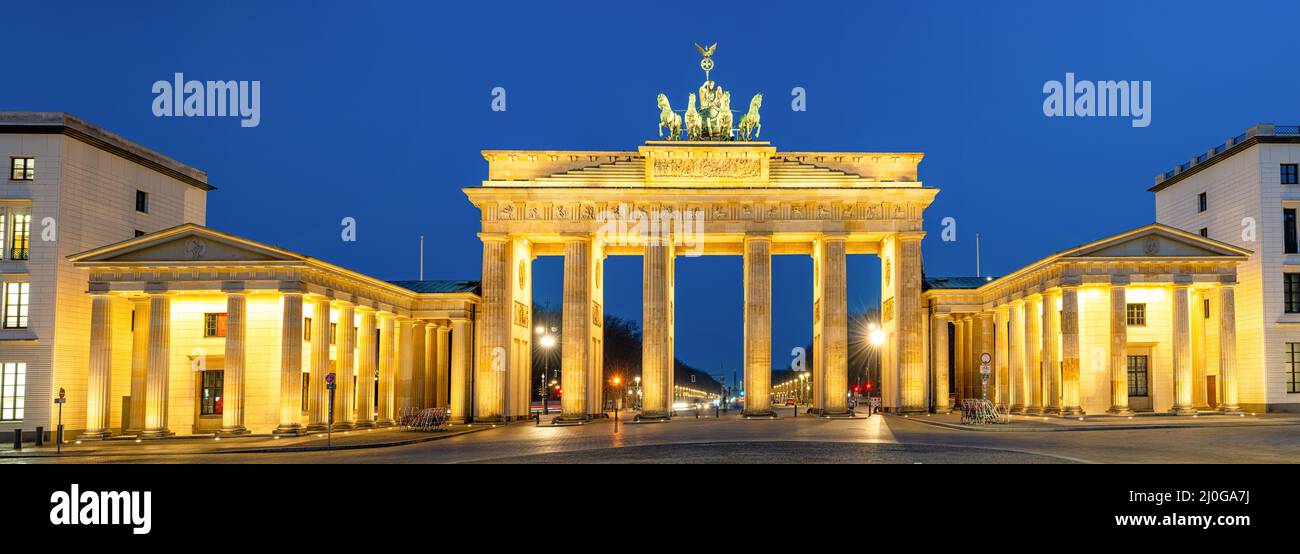 Panorama of the famous Brandenburg Gate in Berlin at night Stock Photo