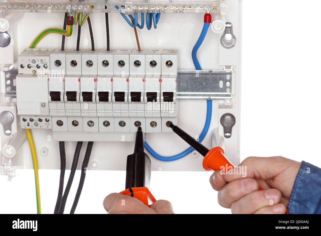 Electrician is testing an electrical circuit Stock Photo