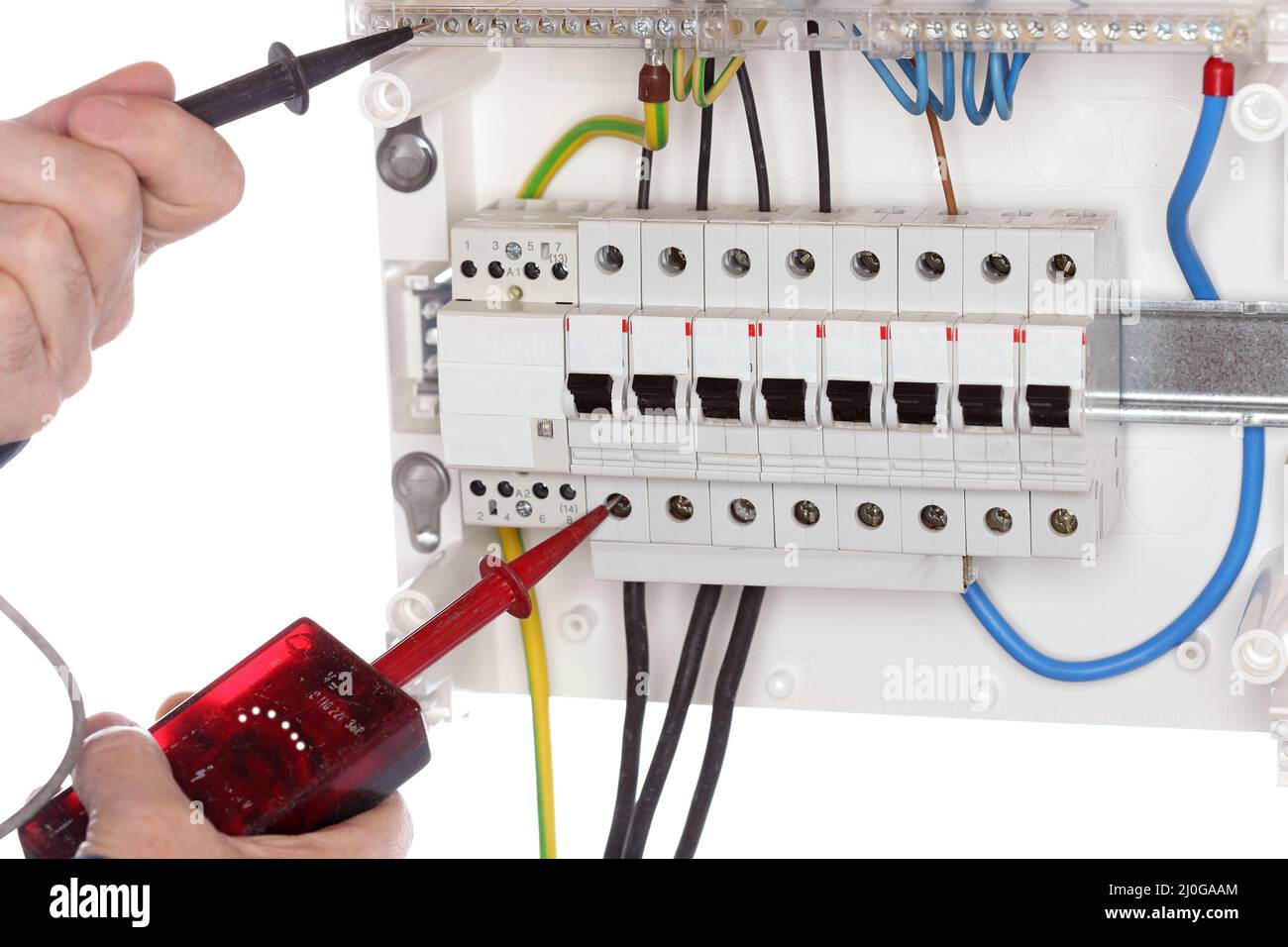 Electrician is testing a circuit Stock Photo