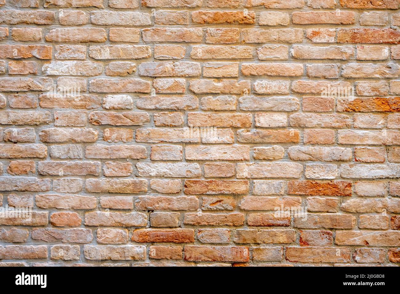 Background from an old and worn red brick wall Stock Photo