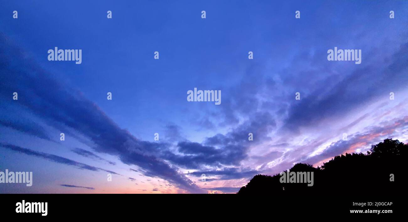 Blue sky with beautiful natural abstract clouds Stock Photo