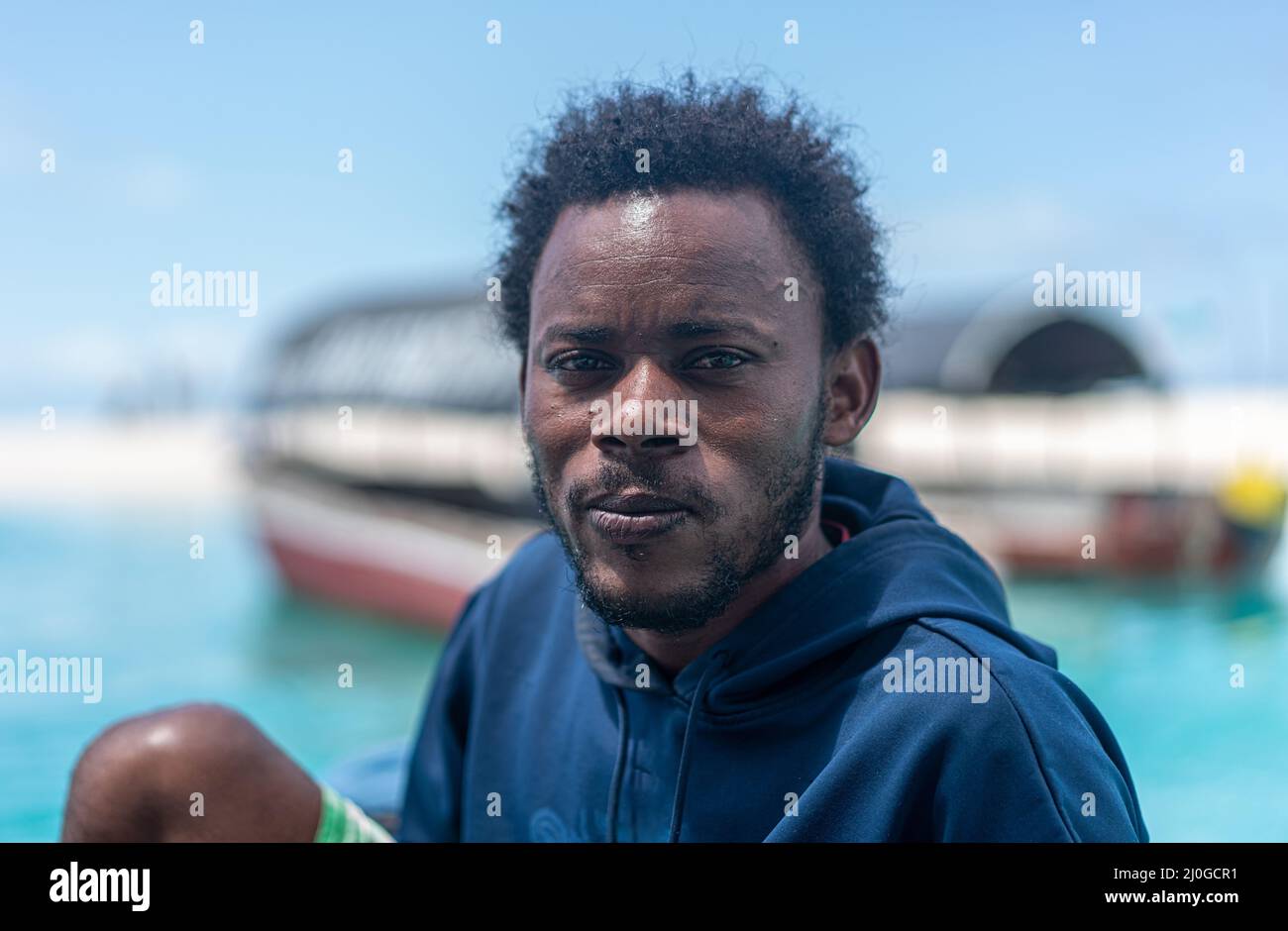 Young black man working on the coast Stock Photo