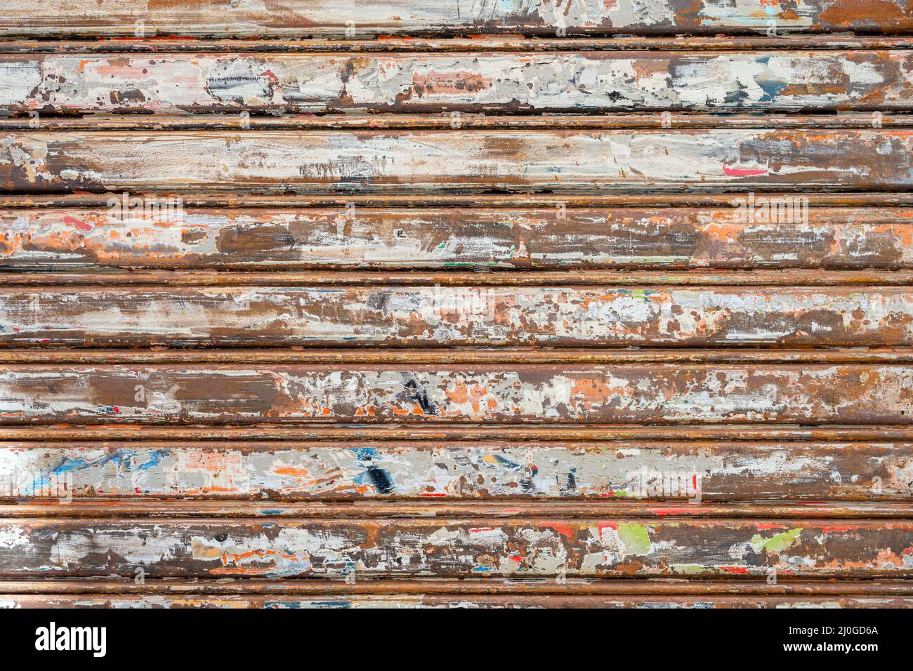 Old metallic store blinds with signs of usage Stock Photo
