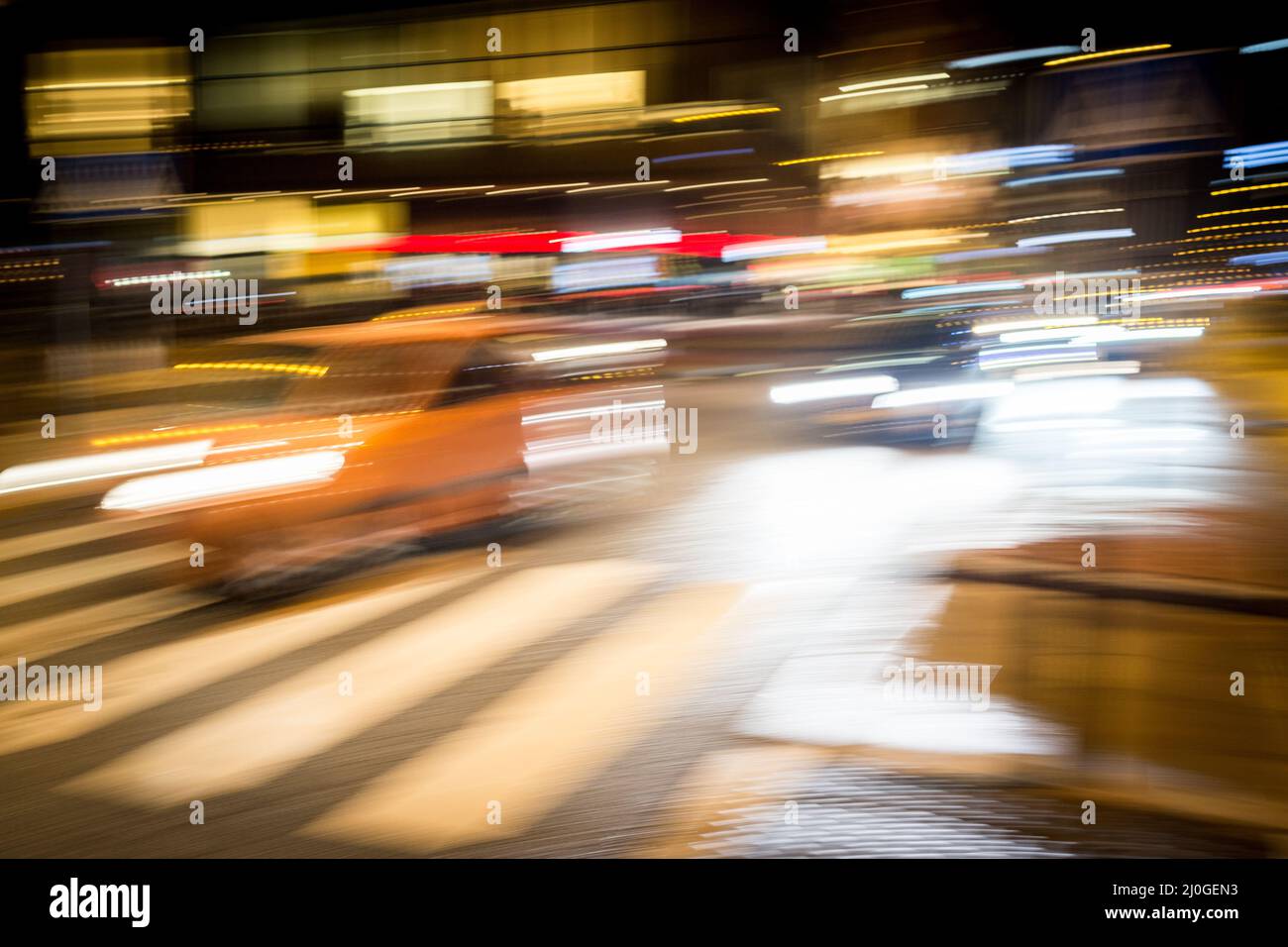 Cars motion on city rain night street Stock Photo - Alamy