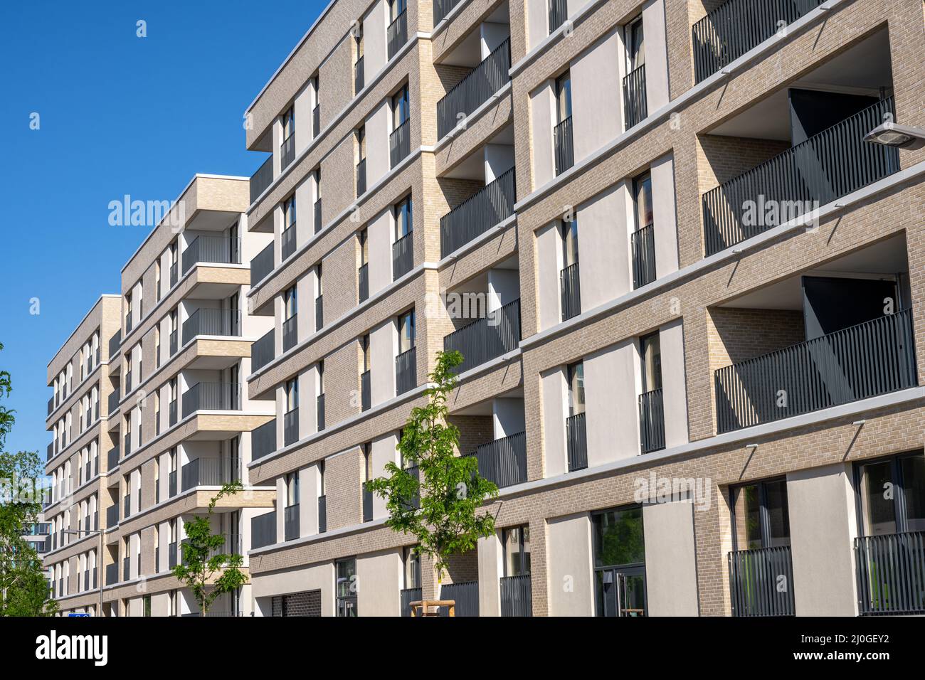 Modern beige multi-family apartment buildings in Berlin, Germany Stock Photo