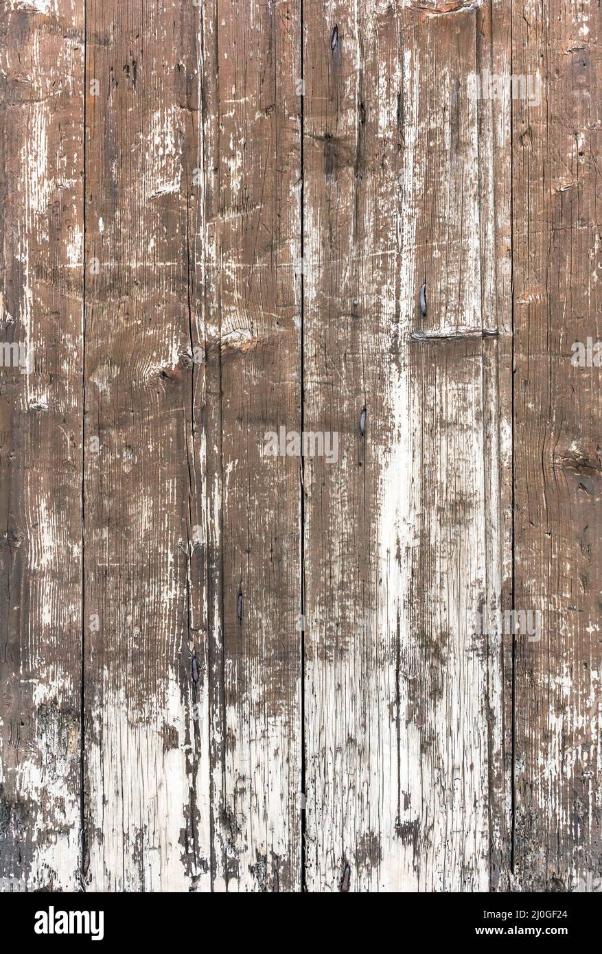 Old wooden plankswith peeling paint Stock Photo