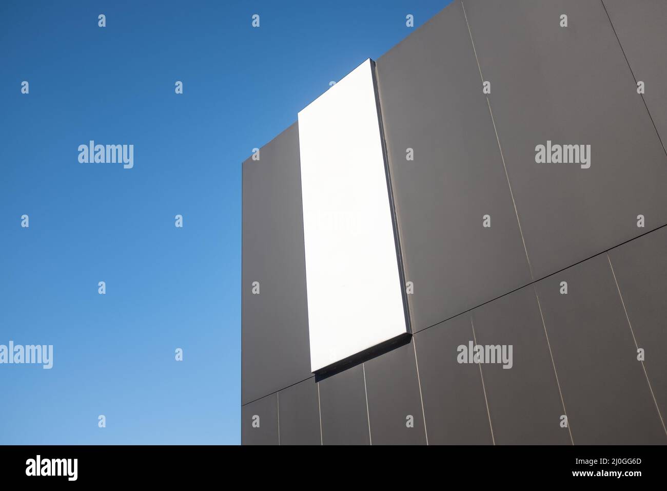 Blank Sign On A Contemporary Urban Retail Building Stock Photo