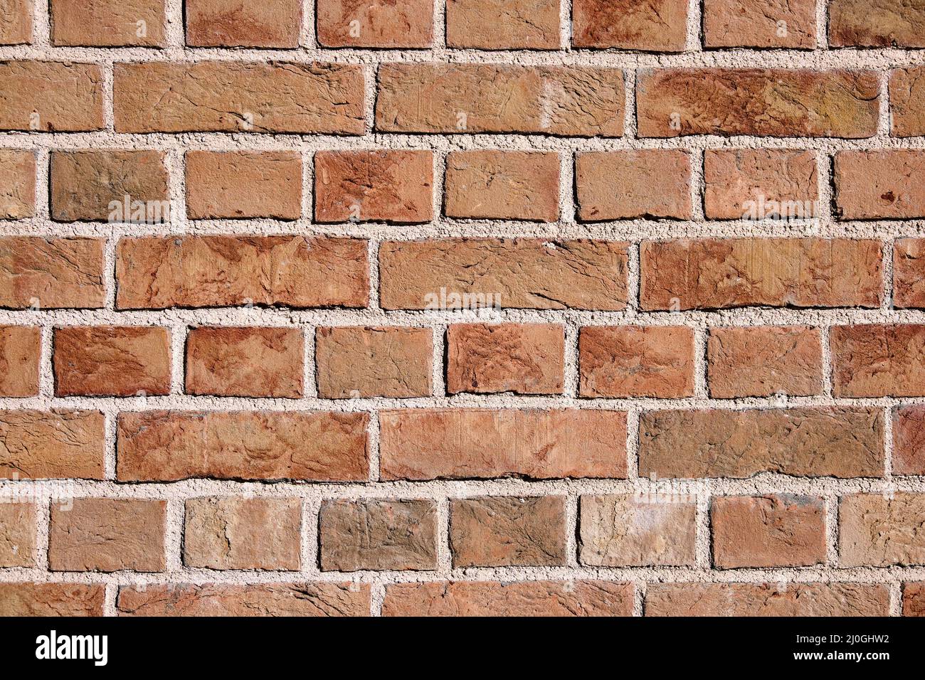 Background from a clean orange brick wall Stock Photo