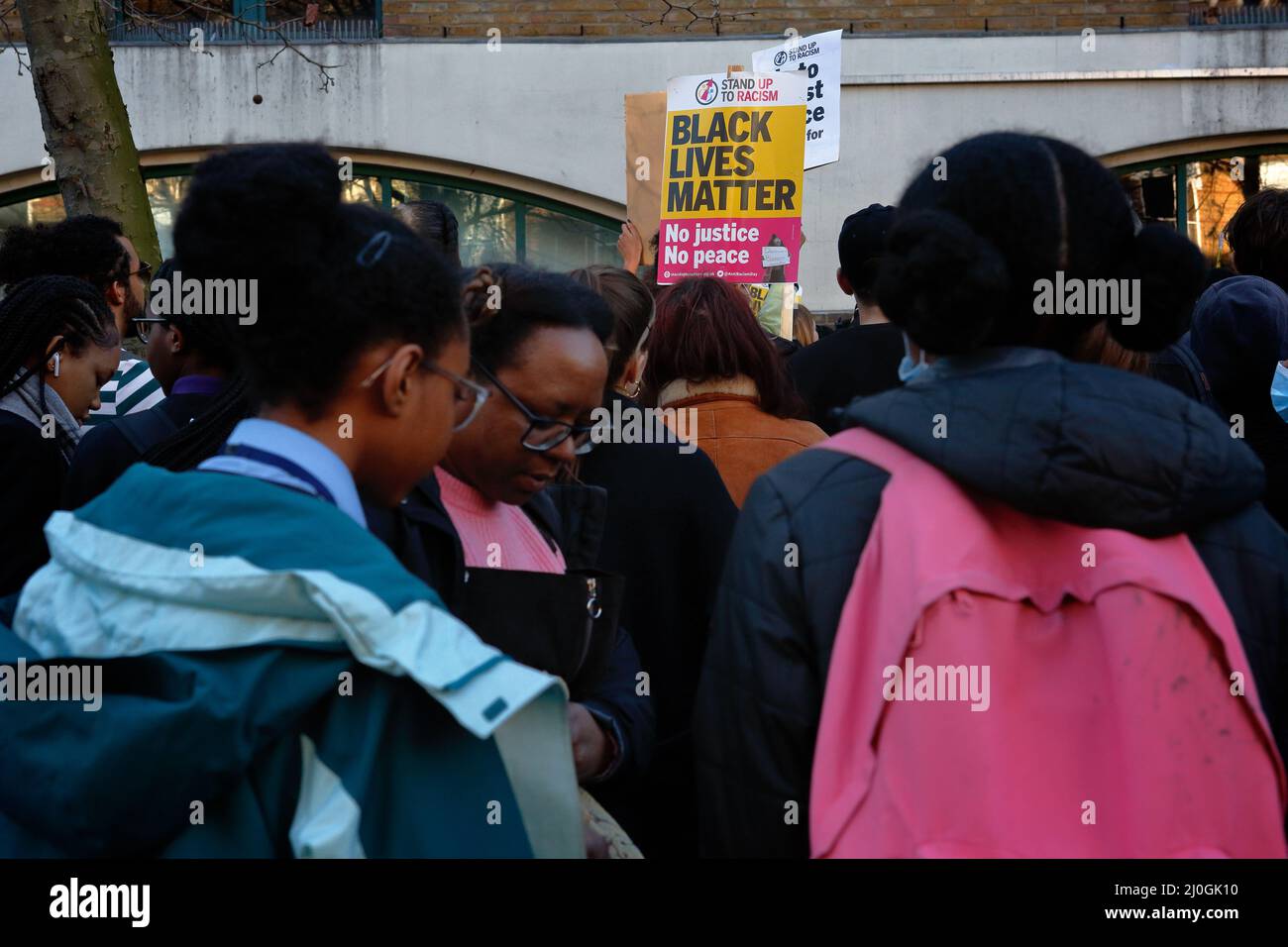 London (UK), 18.03.2022: Protesters gather outside Stoke Newington Police Station in Hackney to demonstrate against the strip- search by police of a s Stock Photo