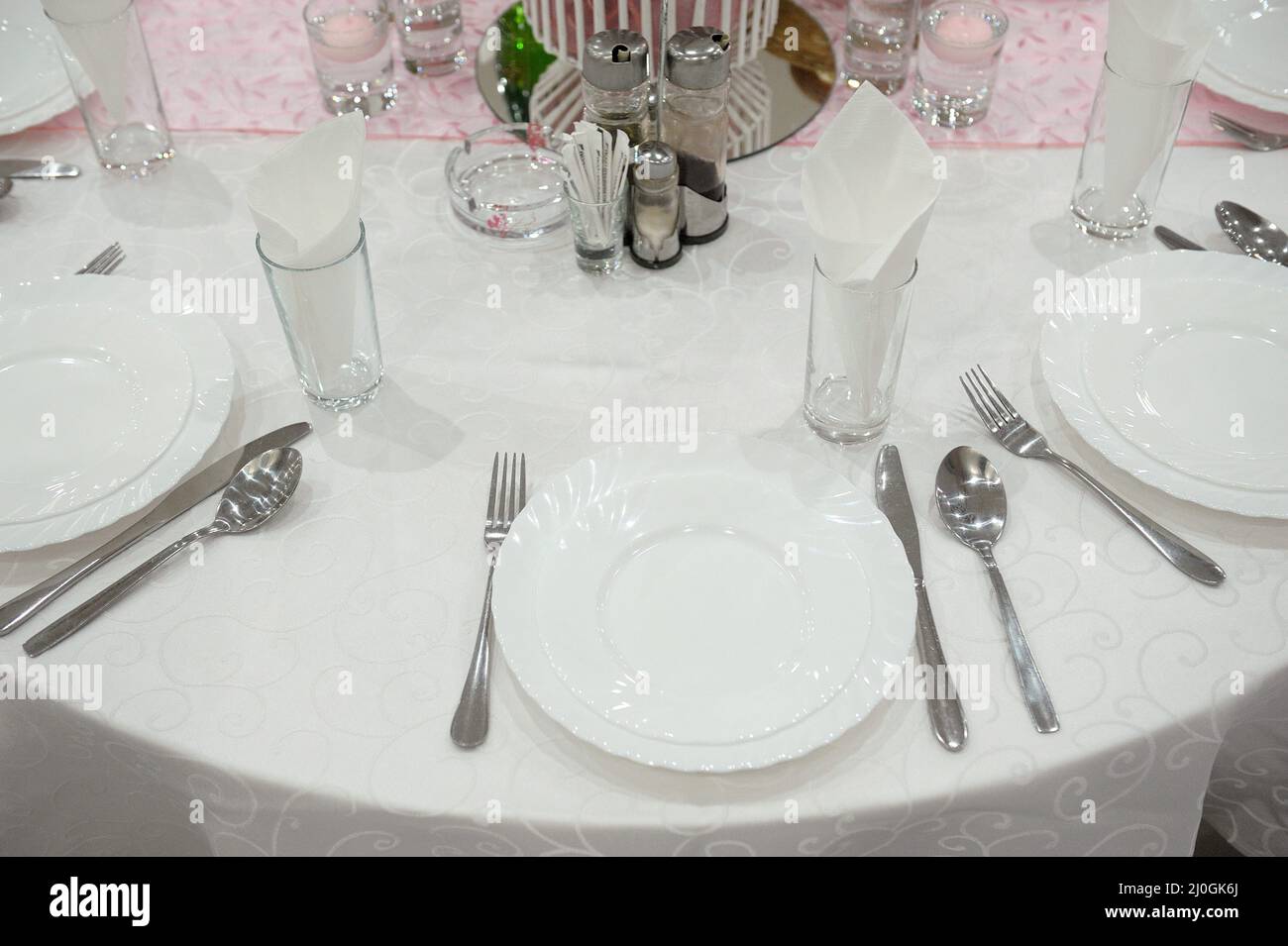 Nice Clean Set Table Top shot of a clean wedding table set Stock Photo - Alamy