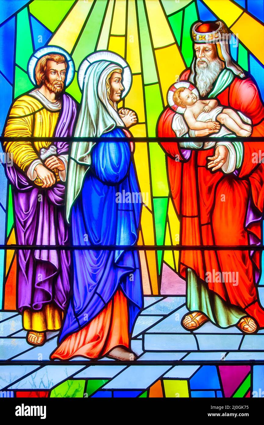 The Magi Visit the Messiah. Stained-glass window with Christian religious symbols seen in the Annunciation of the Blessed Virgin Mary Catholic Church Stock Photo