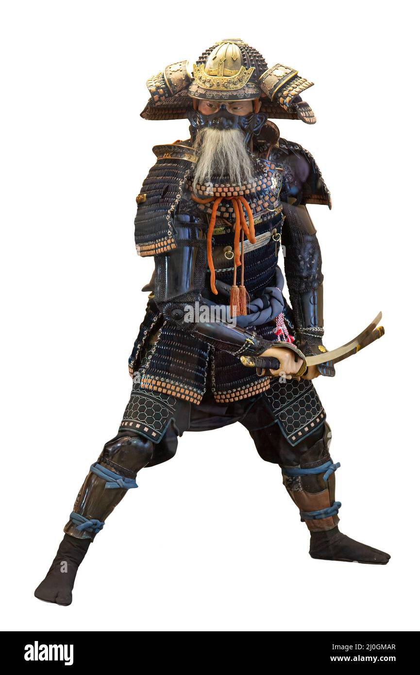 Japanese Samurai in armor standing isolated on white background. Traditional japan warrior armour Stock Photo