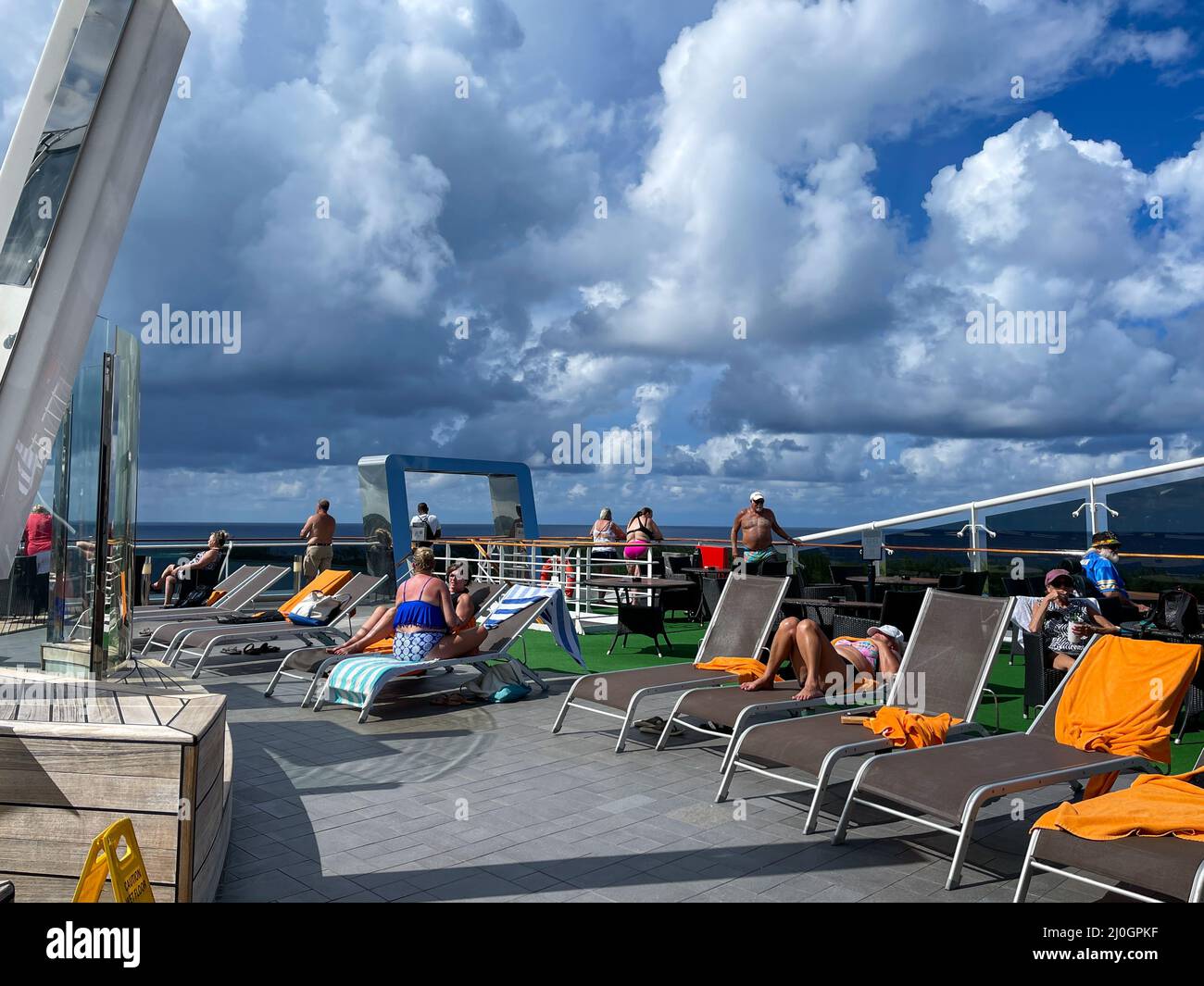 Orlando, FL USA - October 11, 2021:  The quiet adult swimming pool area on the MSC Cruise Ship Divina in Port Canaveral, Florida., Stock Photo