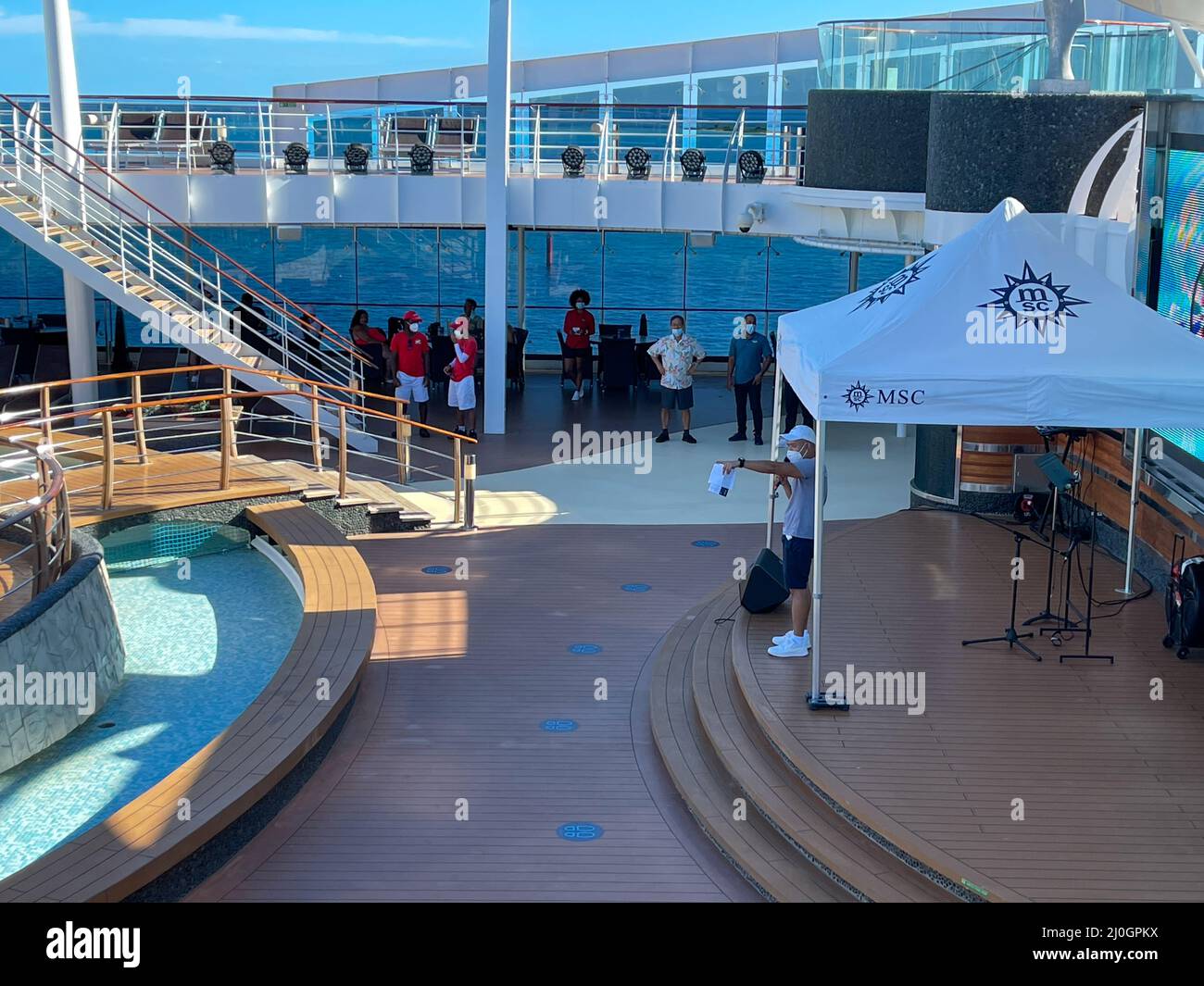 Orlando, FL USA - October 11, 2021:  The Entertainment at the main swimming pool area on the MSC Cruise Ship Divina in Port Canaveral, Florida., Stock Photo