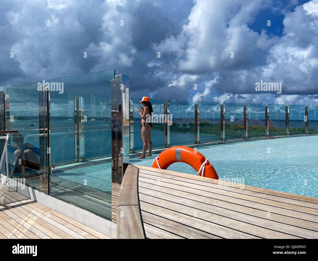 Orlando, FL USA - October 11, 2021:  The quiet adult swimming pool area on the MSC Cruise Ship Divina in Port Canaveral, Florida., Stock Photo