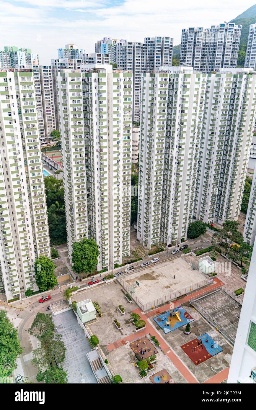The view of residential neighborhood and skyscrapers from rooftop in Hong Kong Stock Photo
