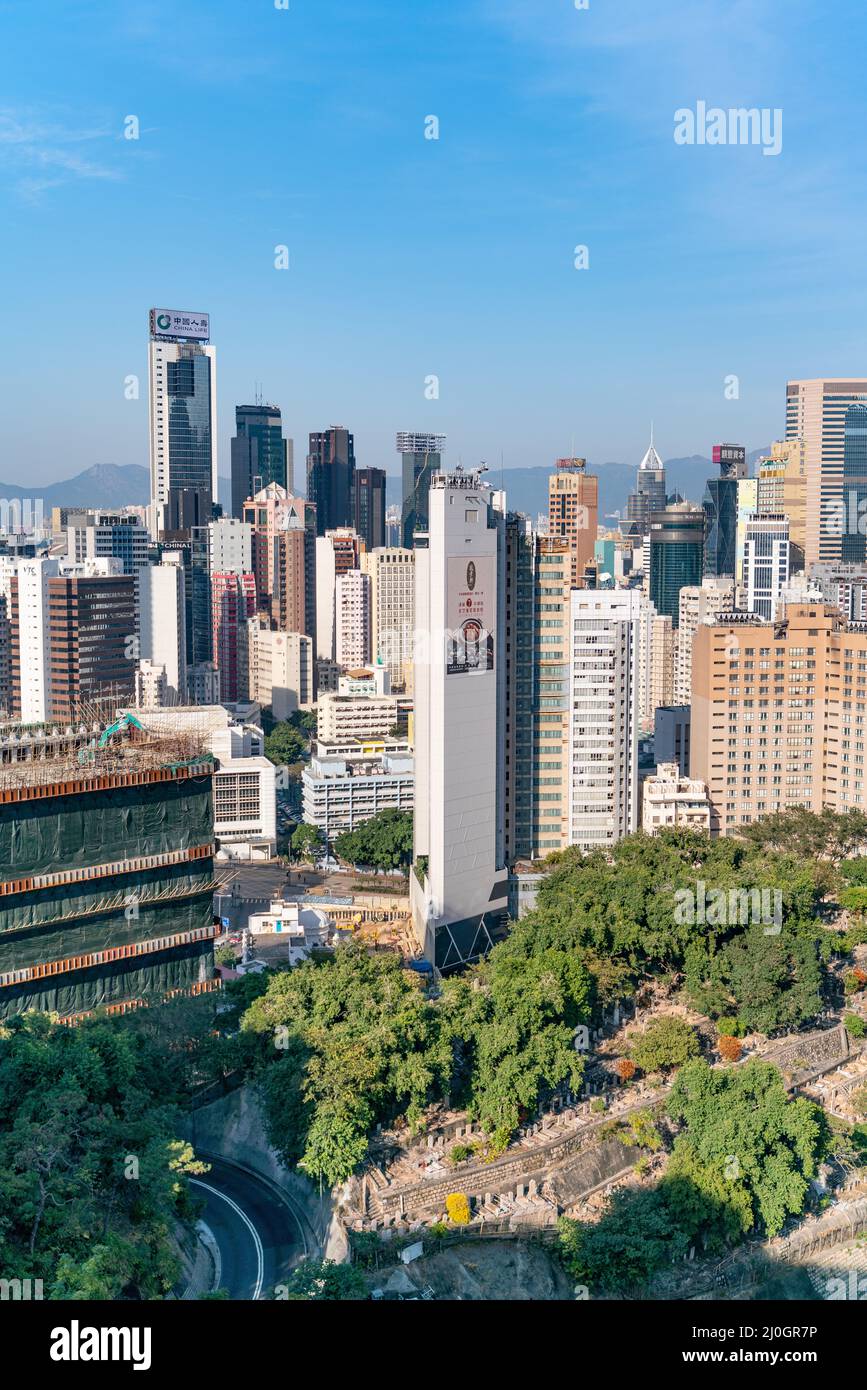 The amazing view of Hong-Kong cityscape full of skyscrapers from the rooftop. Stock Photo