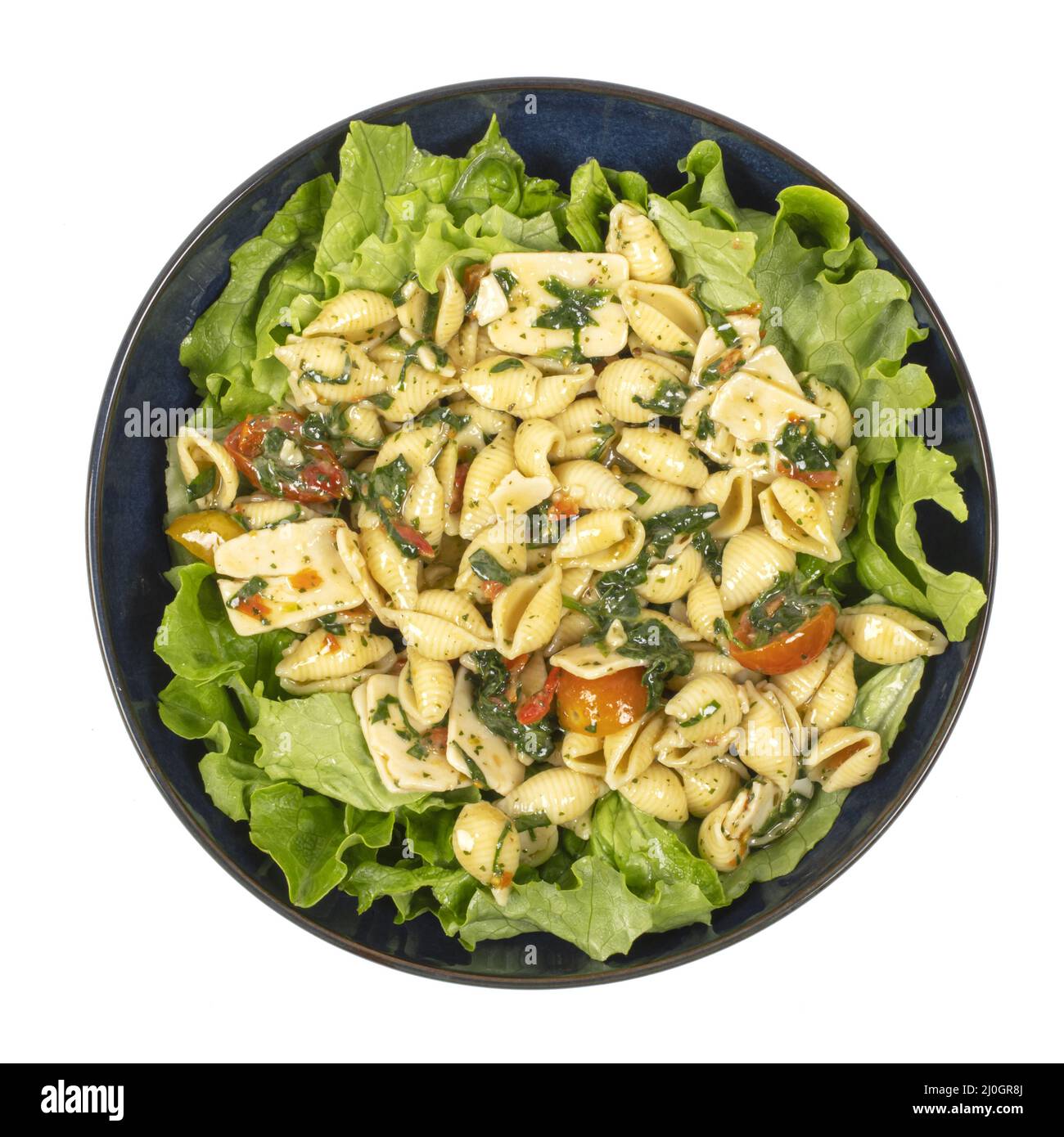 pasta salad in a bowl on white background Stock Photo