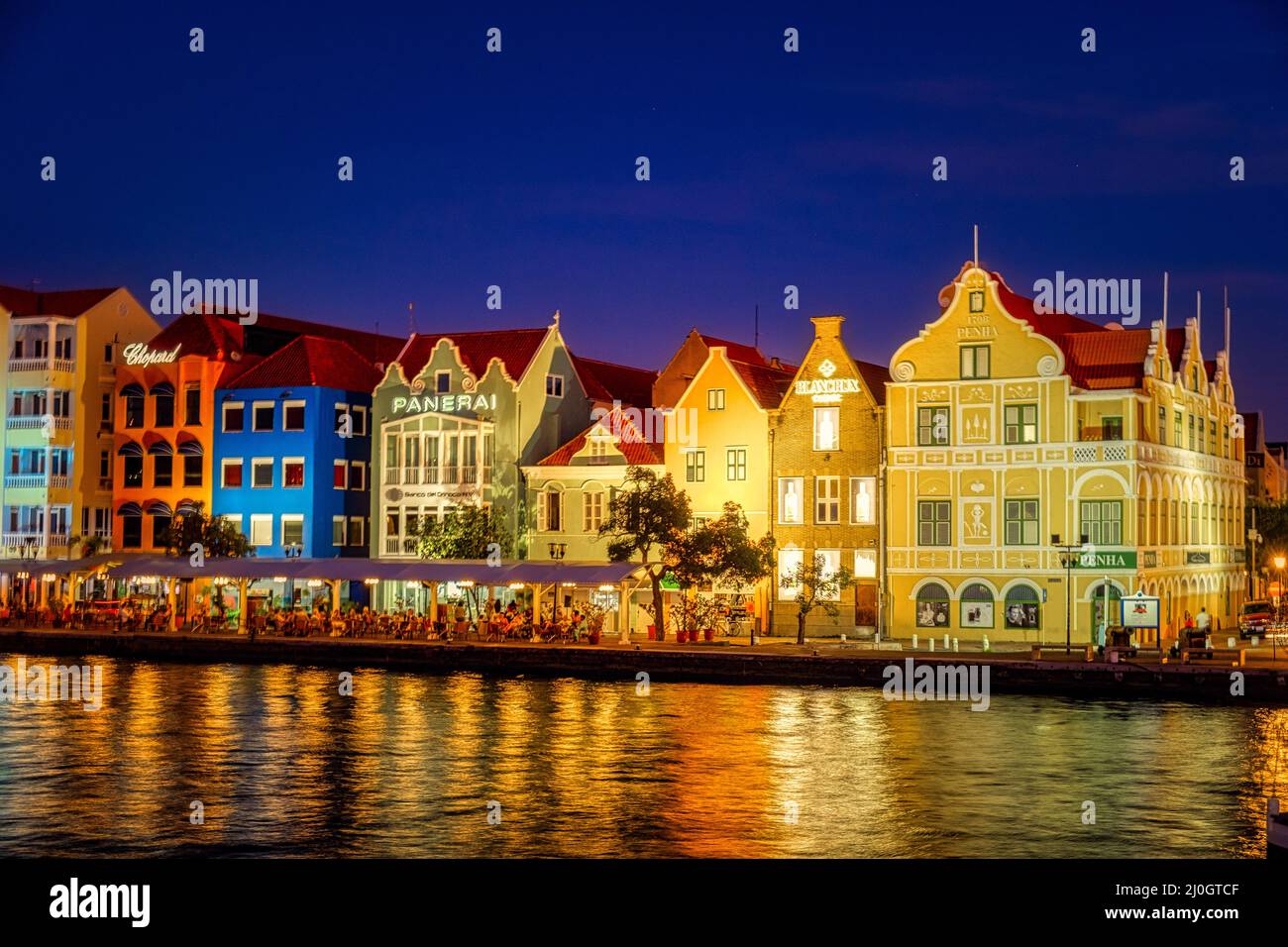 Willemstad, Curacao. Dutch Antilles. Colourful Buildings attracting tourists from all over the world. Blue sky sunny day Curacao Stock Photo