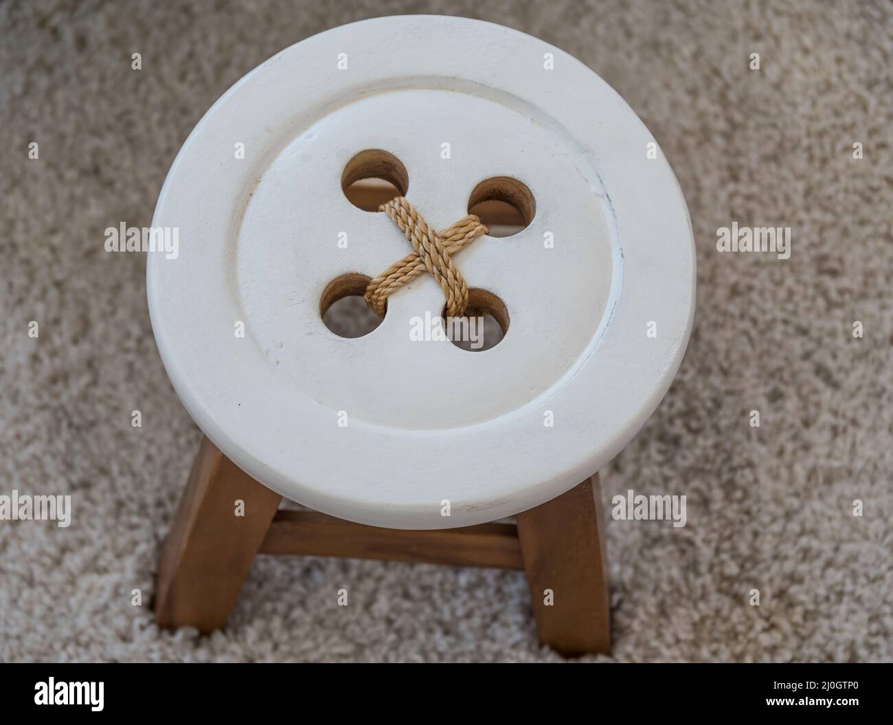 Oversized button as a stool and seating furniture - large shirt button ...