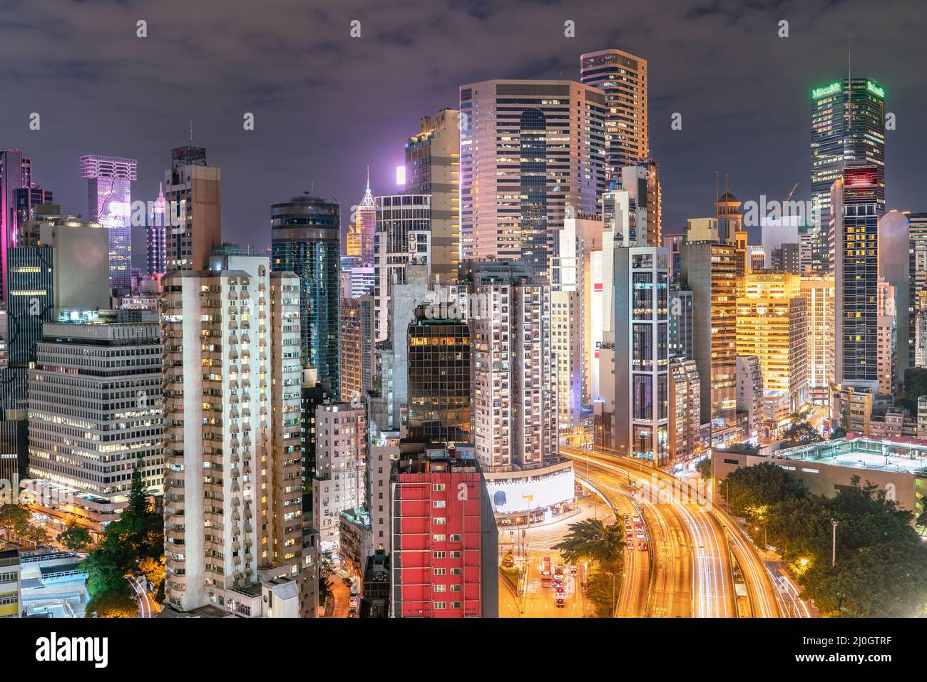 The amazing night and sunset view of cityscape and skyscrapers in Hong-Kong Stock Photo
