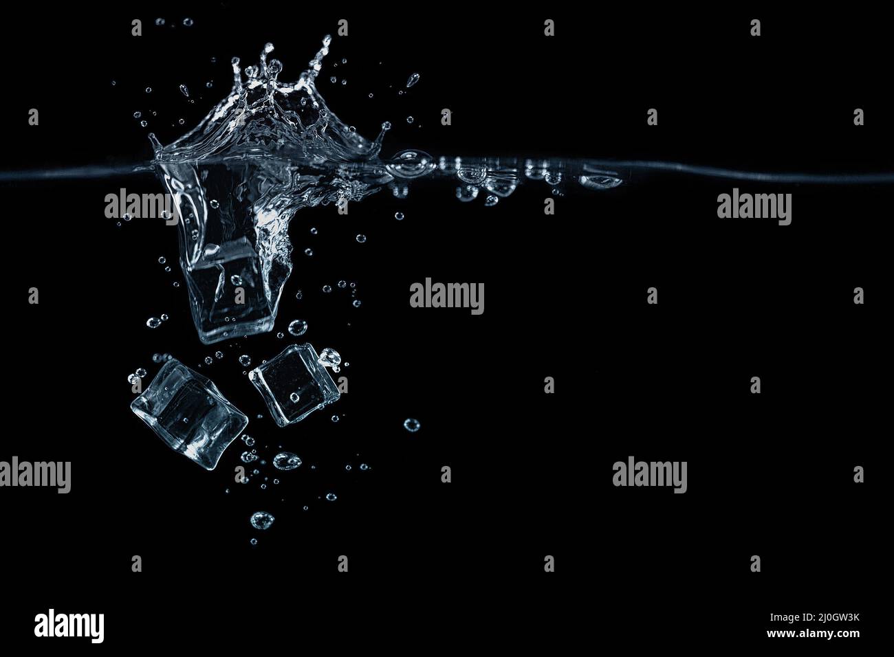 Falling ice cubes Stock Photo